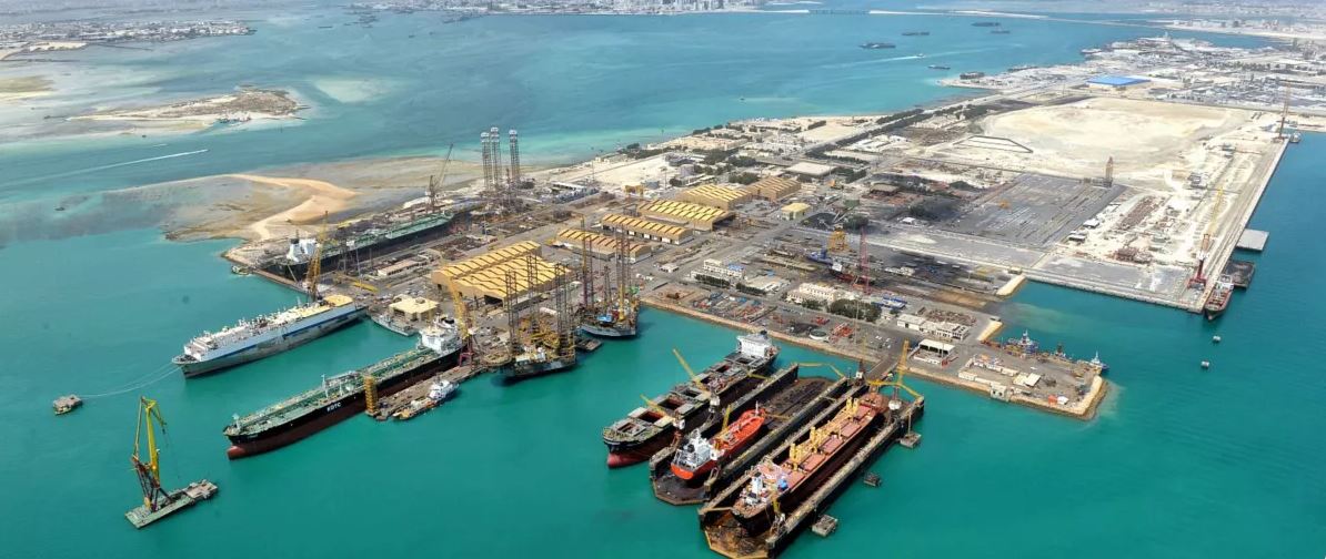Shipyard showing cranes, ships, and engineering facilities for careers
